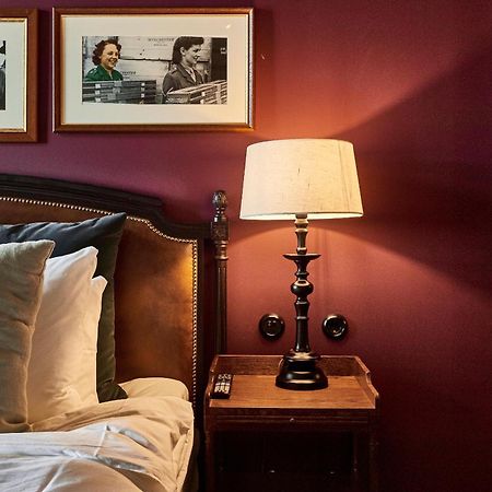Steam Hotel Vasteras Exterior photo A lamp on a bedside table