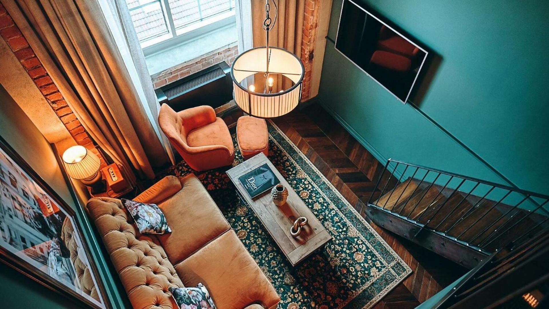 Steam Hotel Vasteras Exterior photo A living room in a hotel