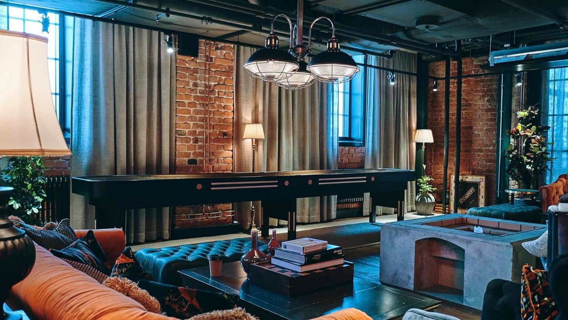 Steam Hotel Vasteras Exterior photo A living room with a piano